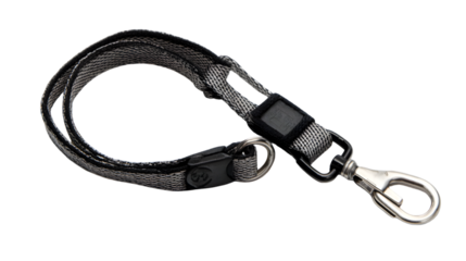 A close up of a gray and black wrist strap with a metal clasp on a black background in studio lighting