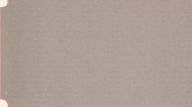 Indie Cinema 16mm Film Overlay with Rustic Grain, Faded Sprockets, Dust Particles, Scratch Flicker, Authentic Frame Texture