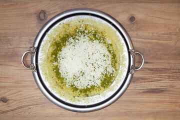 Traditional kunefe dessert with melted cheese and syrup – Turkish sweet pastry kunefe close-up