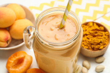 Superfood. Tasty smoothie and ingredients on table, closeup
