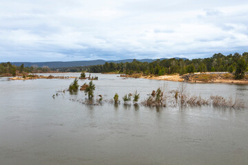 Photograph of the Nepean River flowing through Yarramundi Reserve after major flood damage in the Hawkesbury Region of NSW, Australia.