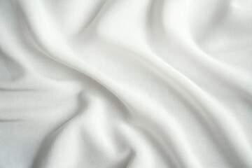 Fototapeta premium Soft white fabric with gentle folds and natural texture creating a calm and peaceful ambiance