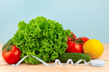Healthy lifestyle concept. Fruits, vegetables, nuts, tape measure
