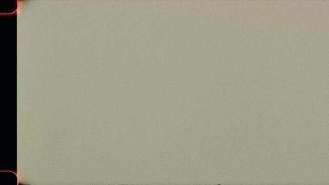 Cinematic 16mm Beauty Overlay with Sprockets, Soft Grain, Dust and Gate Flicker