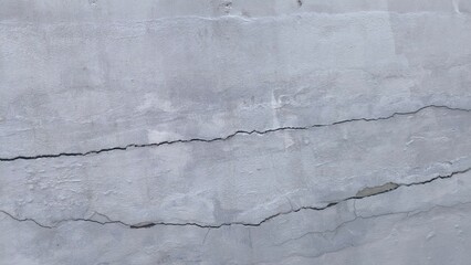 Cracks on concrete walls. Construction problems.