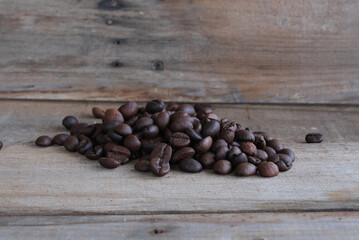 Coffee beans on a wooden background