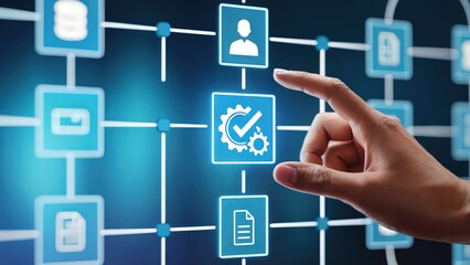 Hand touches automated workflow icon on digital screen showcasing process management