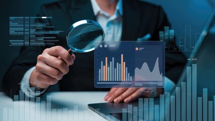 Businessman analyzing financial data with a magnifying glass for strategic decisions