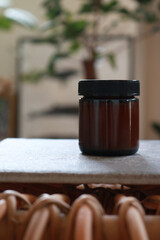 Amber Glass Jar with Black Lid in Natural Light 02