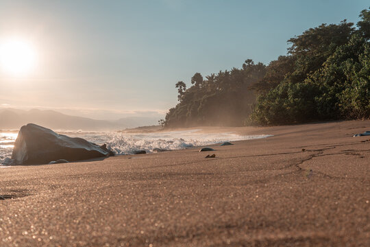 Stunning sunset over a rocky beach with mountain silhouettes in the background. Perfect natural landscape for travel, relaxation, and commercial use with copy space.
- Powered by Adobe