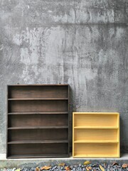 Wooden shelves of different sizes and colors for storing CDs