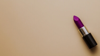 A close-up image of a vibrant purple lipstick applied to a smooth beige background, highlighting the texture and color details.