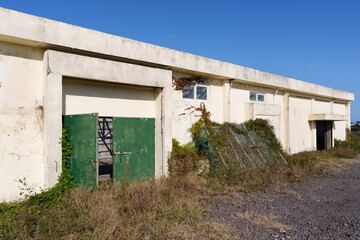 Side view of abandoned factory building