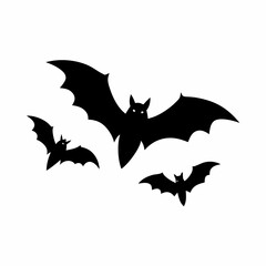 Black bats flying against white background silhouette