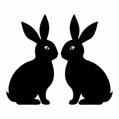 Obraz premium Two black rabbits facing each other silhouette