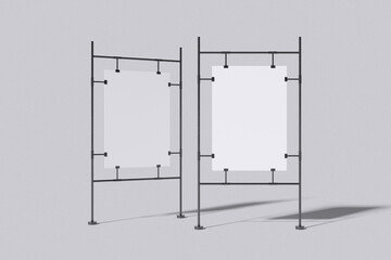 White poster paper with stainless steel stand on grey background for mockup template