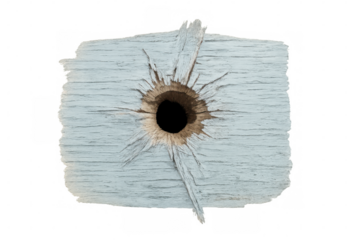 Weathered light blue wooden plank bearing bullet hole, highlighting textural damage against transparent backdrop, revealing wear and vulnerability