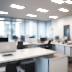 Blurred view showcasing a modern open office space with desks, computers, and natural light streams