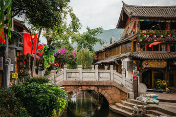 Riverside pavilion with stone bridge in Lijiang Old Town, China