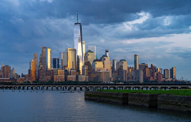 Obraz premium New York City at night. NYC cityscape with skyscrapers. Panoramic of New York City skyline. Manhattan skyline. New York and Hudson River. Downtown NYC. New York skyscrapers.