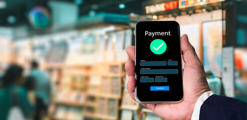 Successful mobile payment in retail store using smartphone app, contactless transaction, cashless...