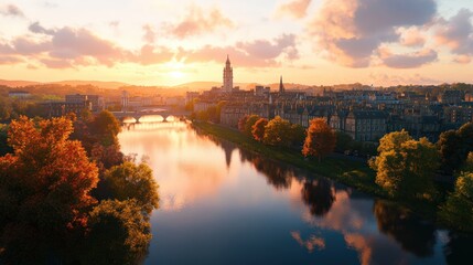 Obraz premium Scenic cityscape with river du sunset featu historic buildings and lush greenery landscape