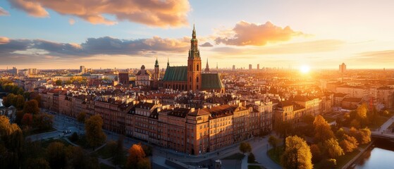 Beautiful aerial view of historic European cityscape du sunset with iconic cathedral and lush greenery