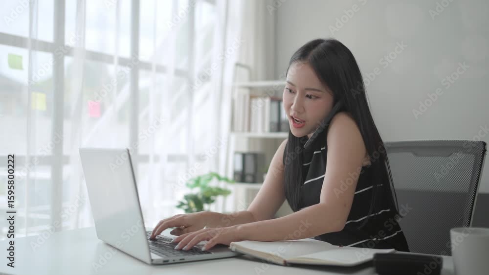Poster professional businesswoman skillfully multitasking while working at desk, simultaneously using lapto