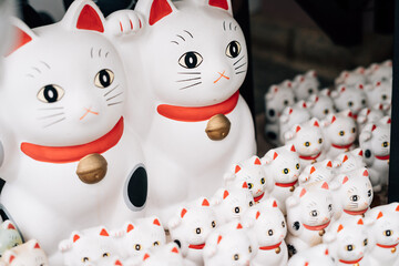 Maneki Neko cat in Japanese shrine