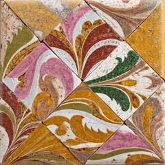Decorative colorful marble mosaic tiles with intricate floral patterns in pink yellow green and white hues for architectural embellishments and artistic design