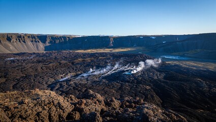 Vast volcanic landscape under a clear blue sky