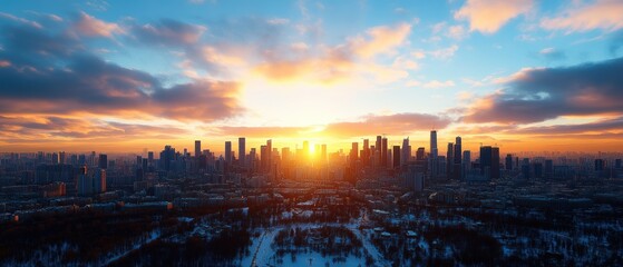 Stunning panoramic view of a modern city skyline at sunrise with vibrant colors and cloudy sky