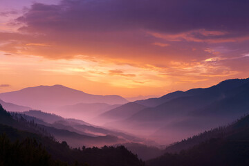 Layers of Mountains in a Colorful Sunrise Mist
