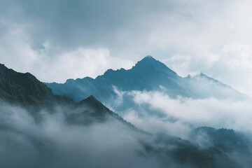 Layers of Mountains in a Colorful Sunrise Mist