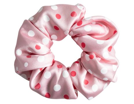 Polka dot silk scrunchie in pink and white, isolated on a transparent background