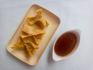 Batagor isolated on white Background, made from fish or chicken dumpling, tofu, tapioca flour...