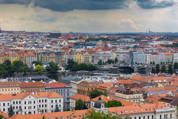 Red roofs of Prague on a foggy day. Prague city view from above.