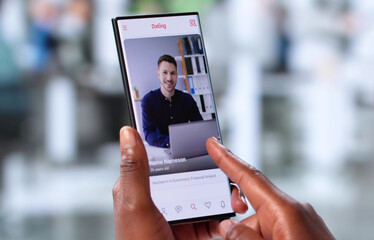 Single African American Woman Holding Smartphone Searching Online Dating