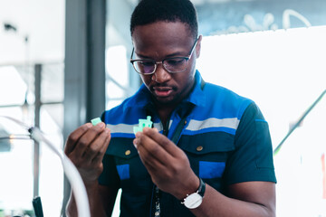 Engineer Inspecting 3D Printed Part