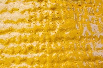 Gold ceramic surface texture background close up