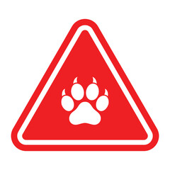Red triangular warning sign with animal paw print, caution symbol for wildlife crossing or pet-related hazards