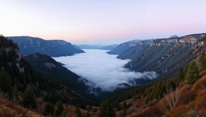 Fototapeta premium Scenic Mountain Valley Overlooking Foggy Wilderness at Sunrise