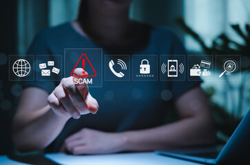 Scam alert warning. cybersecurity concept. Woman interacts warning sign for scams with icons...