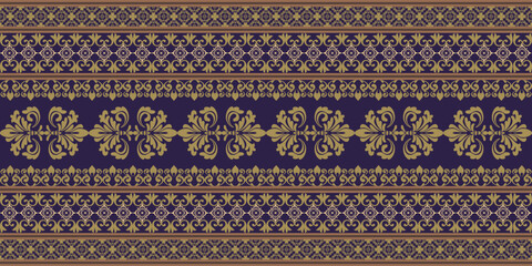 Damask is a luxurious and classic pattern, characterized by symmetrical floral motifs. The colors used are deep purple and gold. This pattern is elegant and is popularly used in textiles and fashion.