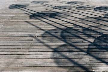 Abstract composition showing the elongated shadows of the iconic Umbrellas sculpture by George...