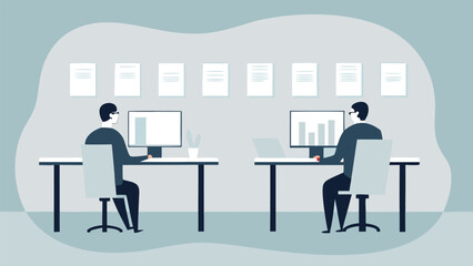 Two employees working at desks with computers and documents on the wall in a modern office space