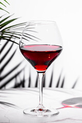 glass of non-alcoholic red wine in a refined setting with elegant surroundings and a touch of sophistication