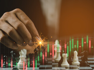Chess game on chess board on stock market or forex trading graph chart for financial investment...