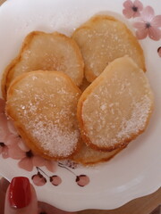 Pancakes in a bowl, breakfast made with your own hands, in a hurry