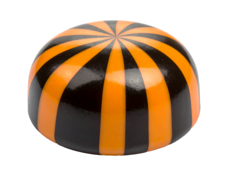 Round caramel candy for Halloween, lollipop. Black and orange striped candy isolated on white background.	